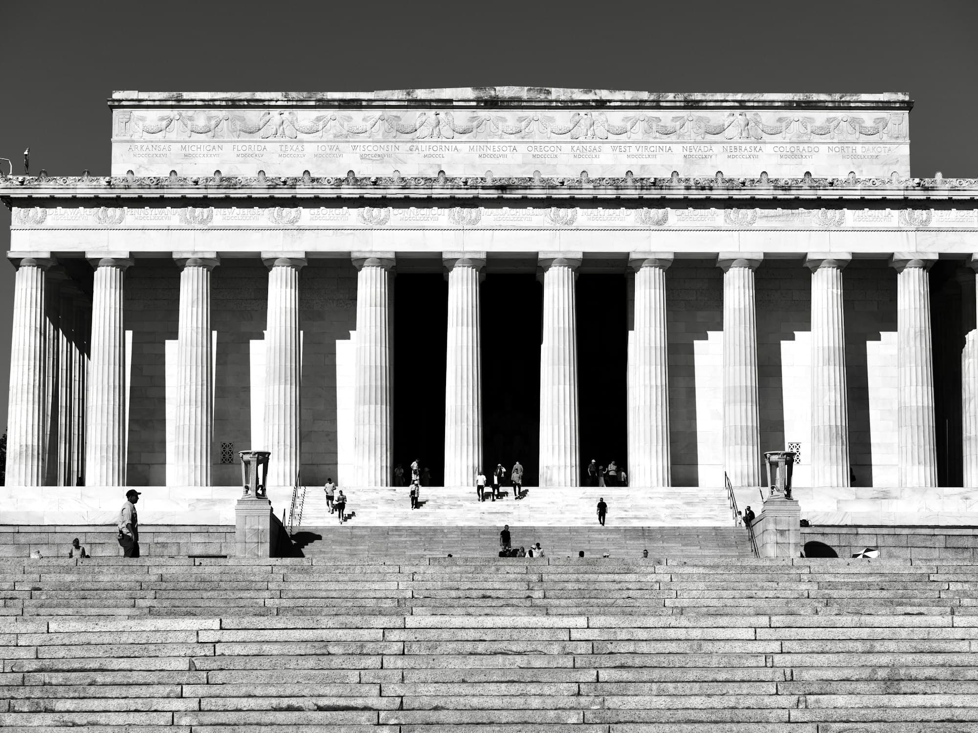 The Lincoln Memorial colonnade and steps in black and white